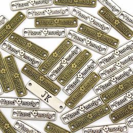 Etiquetas de metal hechas a mano de 10 piezas rectángulo vintage etiqueta de costura de bronce plateado para chaquetas de vestir accesorios de prenda de aleación
