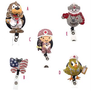 10pcs / lot Sparkly Strass Cristal Infirmière Badge Bobine Médecin Symbole Rétractable Animal Chien Papillon Bonhomme De Neige Forme Badge R2997