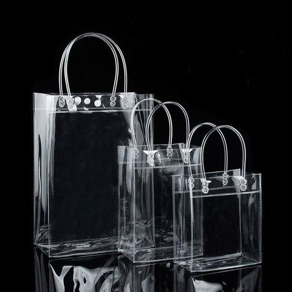 10pcs PVC Sacs-cadeaux en plastique avec poignées Sacs d'emballage à vin en plastique transparent du sac à main Party Favors Fashion PP avec Button198B