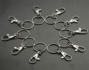 10pcslots classiques clés d'anneau en argent argent en métal pivotant des clips de homard pivotants