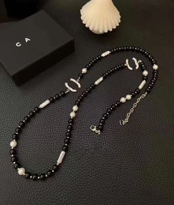 10Style Black Pearl Chains Designer Colliers de haute qualité Pendre Marque Lettre Fashion Men de cou collier Chure Bijoux de Noël Collier de Noël