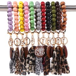 LLavero de pulsera de madera de 11 estilos con llave de borlas de leopardo DIY brazalete de cuentas de fibra de madera Pandent decorar moda