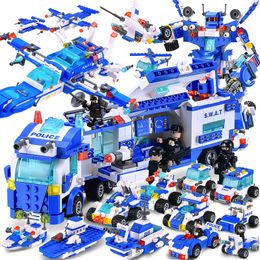 1100 pièces Kit de construction de commissariat de police de ville jouets en bloc pour tout-petits camion de centre de commande mobile SWAT avec voiture de police hélicoptère bateau de patrouille adapté aux garçons et aux filles