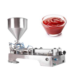 Machine de remplissage liquide de pâte à double tête 110V 220V pour la machine de remplissage pneumatique d'huile d'olive de beurre de tomate de sauce chili à la crème