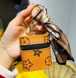 11 estilo Bolsa de lápiz labial Llaveros Carta Bufanda de seda Llaveros Anillo Diseño de moda PU Cuero Monedero Estuche Colgante Llavero Encanto Joyería para hombres Mujeres Regalos