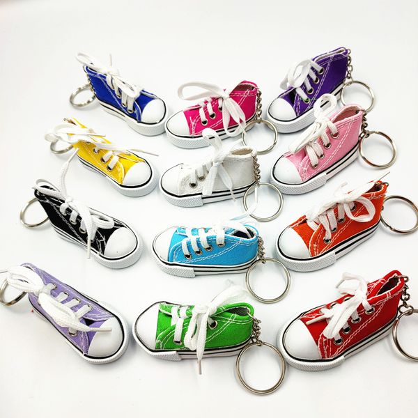 12 colores creativos Mini zapatos de lona llaveros hombres mujeres colgante Casual zapatos deportivos llavero bolsa coche llavero accesorios regalo precio a granel