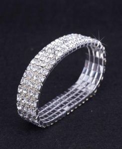 12 pièces Lot 4 Row Crystal Diamante Rhinestone Elastic Bridal Bangle Bracelet Stretch Accessoires de mariage entiers pour les femmes1980827