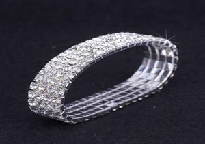 12 pièces Lot 4 Row Crystal Diamante Rhinestone Elastic Bridal Bangle Bracelet Stretch Accessoires de mariage entiers pour les femmes6275861