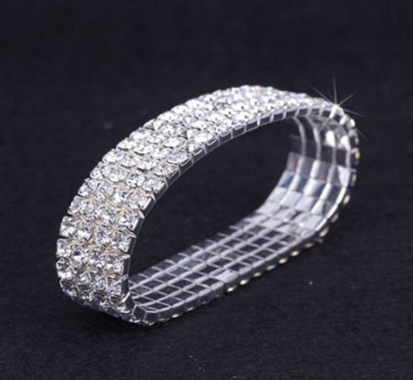 12 pièces Lot 4 Row Crystal Diamante Rhinestone Elastic Bridal Bracelet Bracelet Stretch Accessoires de mariage entiers pour les femmes3777114