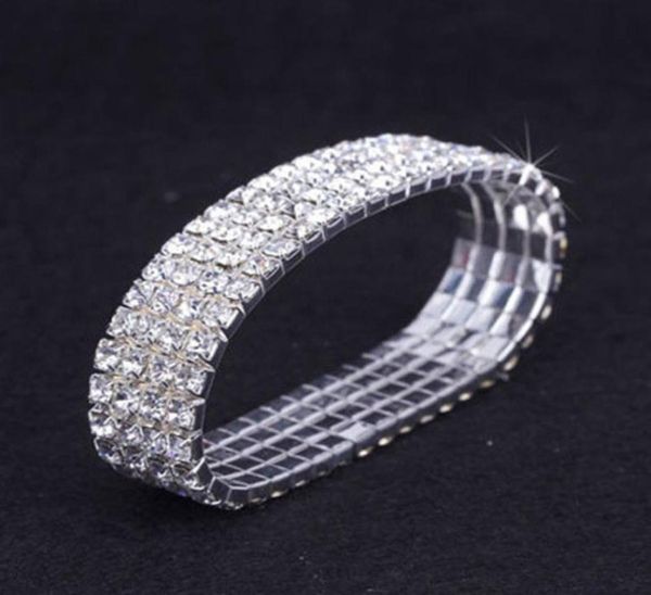 12 pièces Lot 4 Row Crystal Diamante Rhinestone Elastic Bridal Bracelet Stretch Stretch Accessoires de mariage entiers pour les femmes9701142