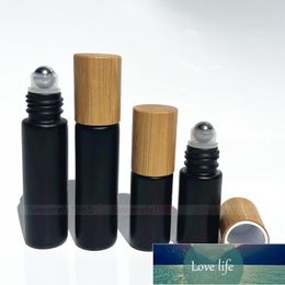 12 Uds 5ML 10ML tapa de bambú Natural/tapa gruesa de vidrio negro rollo de aceite esencial en botella Bola de rodillo de Metal para Perfume aromaterapia