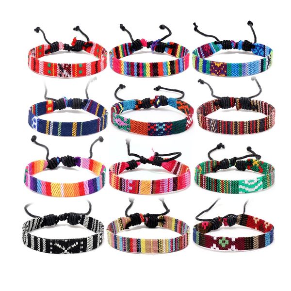 12 unids / set Brazalete BOHO Brazaletes Trenzados a mano Joyería de moda étnica Pulseras Amistad Regalo de fiesta Lote al por mayor Corbata de cuerda de algodón