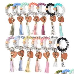 14 couleurs Saint Valentin Fête des Mères Amour Bois Chip Sile Perle Bracelet Porte-clés Party Favor Bracelet Porte-clés Glands Handchain Porte-clés Dhkj6