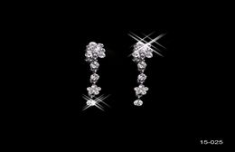 15025 Conjunto de collar y pendientes de trébol de cuatro hojas con diamantes de imitación sagrados, conjunto de joyas para fiesta nupcial con cierre de langosta, conjuntos de joyas baratos para la noche de graduación5230018