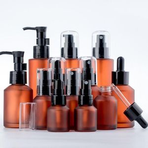 15 ml 30ml 60 ml 100 ml Amber Brown Glass Bottle Protable Pumple de pulvérisation Pumple de pulvérisation Vide Rechargeable Travel Cosmetic Cream Shampooing Emballage de shampooing