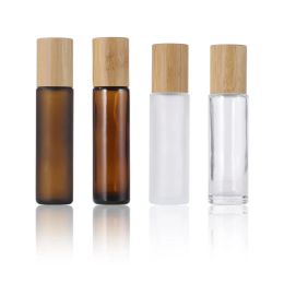 Rollo vacío de 15 ml en botellas de vidrio con tapa de bambú, bola de rodillo de acero, botella de perfume de aceite esencial de vidrio esmerilado transparente ámbar de alta calidad