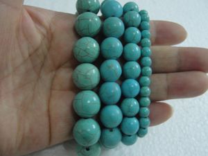2017 offres spéciales perles faites à la main 15 pièces * bijoux de mode 14mm Turquoise perle bracelets extensibles Bracelet à breloques tibétaines