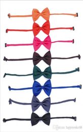 16 colores Pe Pet Tie Dog Collar Accesorios Flower Suministros de decoración de color puro Bowknot Corbito2109350