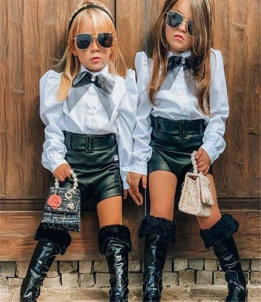 16Y Moda Niños Niñas Conjuntos de ropa Niños pequeños Niñas Encaje Bowtie Blusa Camisas TopsPU Pantalones cortos de cuero Chándales Trajes J4102376