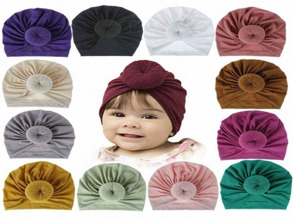 18 couleurs enfants accessoires nouveau-né enfant en bas âge enfants bébé garçon fille Turban coton bonnet chapeau hiver chaud doux casquette solide noeud doux Wr2885849