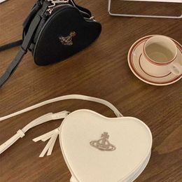 18% KORTING Designer tas nieuwe westerse keizerin-weduwe liefde Saturn enkele schouder Crossbody handtas unieke High Sense tas voor vrouwen
