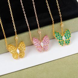 Collier pendentif de charme de créateur de papillon mignon de luxe en or 18 carats amour doux rose vert jaune cristal diamant chaîne croisée élégant colliers ras du cou bijoux