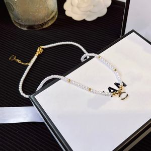 18K vergulde roestvrijstalen stalen hanger ketting mode dames designer merk dubbele letter kettingen choker ketting kristal imitatie parel bruiloft sieraden geschenken