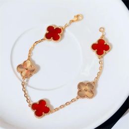 Oro rosa de 18 quilates 4 Trébol de cuatro hojas Diseñador de lujo Pulsera Pendientes Collar Conjuntos de joyas Marca famosa Pulseras de piedra roja Brazalete Anillos para los oídos Collares