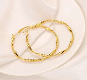 18k gele fijne oorbel goud GF eindeloze hoepel oorbellen Huggie gedraaide lage oorhoepels set ronde sieraden3048353