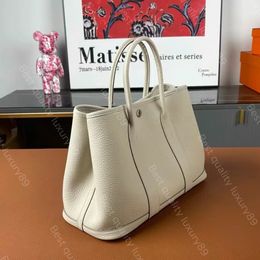 19A Classic Handbag Fashion Tote Casual Commuter Bag 30 36cm Designer Inspiré par le jardin à l'aide de la negonda de vache de vache Négonda