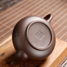 1pc Juego de té hecho a mano auténtico yixing té macizo de té morado xishi filtro tetera belleza Beauty le da a alguien un regalo de 180 ml