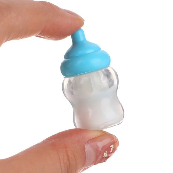 1pc Kids Fingen Juegos Juegos Mini Nipple Baby Doll Pacifier Botella para Doll House Feeding Accesorios de bricolaje Color aleatorio