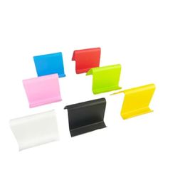 Accesorios de teléfonos móviles de 1pc Universal Candy Mini Mini Store de escritorio soporte para teléfono celular para iPhone Samsung Xiaomi Parts