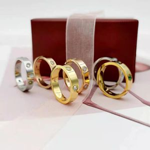 1 stks Drop Shippin g luxe designer sieraden band ringen roestvrijstalen liefdesontwerpers ring mode vrouw sieraden mannen bruiloft belofte ringen voor vrouwelijke vrouwen cadeau