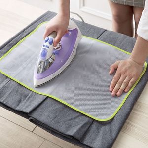 1pcs Nouveau arrivée en tissu résistant à la chaleur Mesh Ironing Board Mat Tyne Couvre Protéger le coussin de repasser