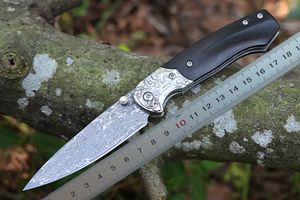 1 Unids Nuevo M5513 Cuchillo plegable de Damasco de alta calidad VG10 Hoja de acero de Damasco Hoja de punto de caída Ébano con mango de cabeza de acero grabado Cuchillos de bolsillo EDC Herramientas EDC