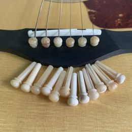 Pins de puente de guitarra portátil de 1pcs Nuez de silla de silla