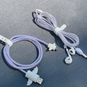 Cables de audio 1 rollo Estilo de color láser 1.55M Cable de línea de datos de carga USB Protector de cable Resorte de protección de cable