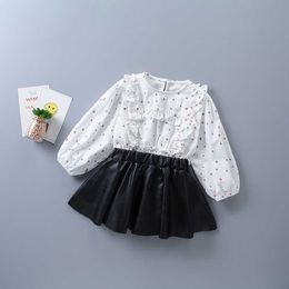 2-7 años Conjunto de ropa de niña de alta calidad Camisa de patrón de lunares de moda de otoño + falda de cuero para niños 210615