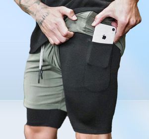 2 in1 Running Mens Gym Sports Shorts intégrés Téléphone Pocket Douner Pantalon Pantalon Gym Bodybuilding Running Pocket Casual Pan7164612