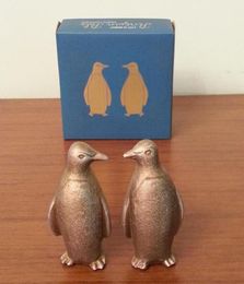 2 piezas Estatuas de pingüino de hierro fundido de color