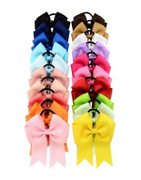 20 colores Bowknot Solid Girls Cheerleading Hair Bow Grosgrain Ribbon Cheer Bow Banda elástica Ponytail Hair Holder para niña Mujer 8727382