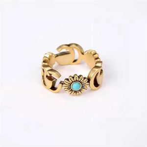 20% korting op 2023 Nieuwe designer sieraden armband ketting Daisy ring bronzen bloem Turquoise Ring voor koppels