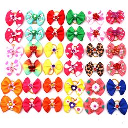 200 unids / lote Suministros para perros Grooming Pet Hair Bows bowknot horquilla Suministros Accesorios de vacaciones Y112289