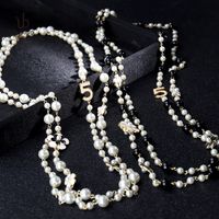 Mode Luxus-Designer klassische Blumen elegante helle Perle mehrschichtige Halskette langer Winter Pullover Erklärung für Frau