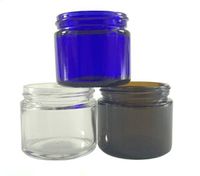 60ml 2 oz vasetto di vetro 60g chiaro ambrato di colore blu con il coperchio nero del contenitore di immagazzinaggio vaso di vetro Cosmetic