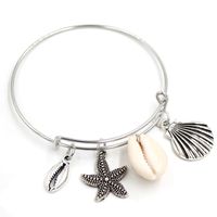 Venta al por mayor Nueva Llegada Charm Bracelets Snap Jewelry Cowrie Shell Bracelet Seashell Bangle Sea Shell Jewelry Regalos para las mujeres Chicas