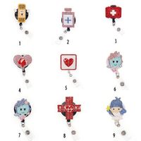 10pcs/lote 9 tons de estilo anéis de coração pílula de coração cross esmalte shinestone enfermeira de enfermeira biltizador de carretel com clipe de jacaré
