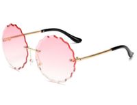 Nieuwe stijl Ocean Slice Zonnebril Europese en Amerikaanse mode-bril Snijzijde Zonnebril Dames Frameloze Metalen Zonnebril