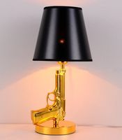Cross- border spot gold- plated pistol table lamps hotel bedsi...